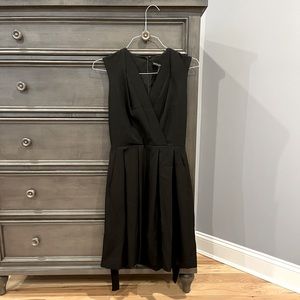 Womens black wrap dress. Brand: White House Black Market. Size 6. Great quality.